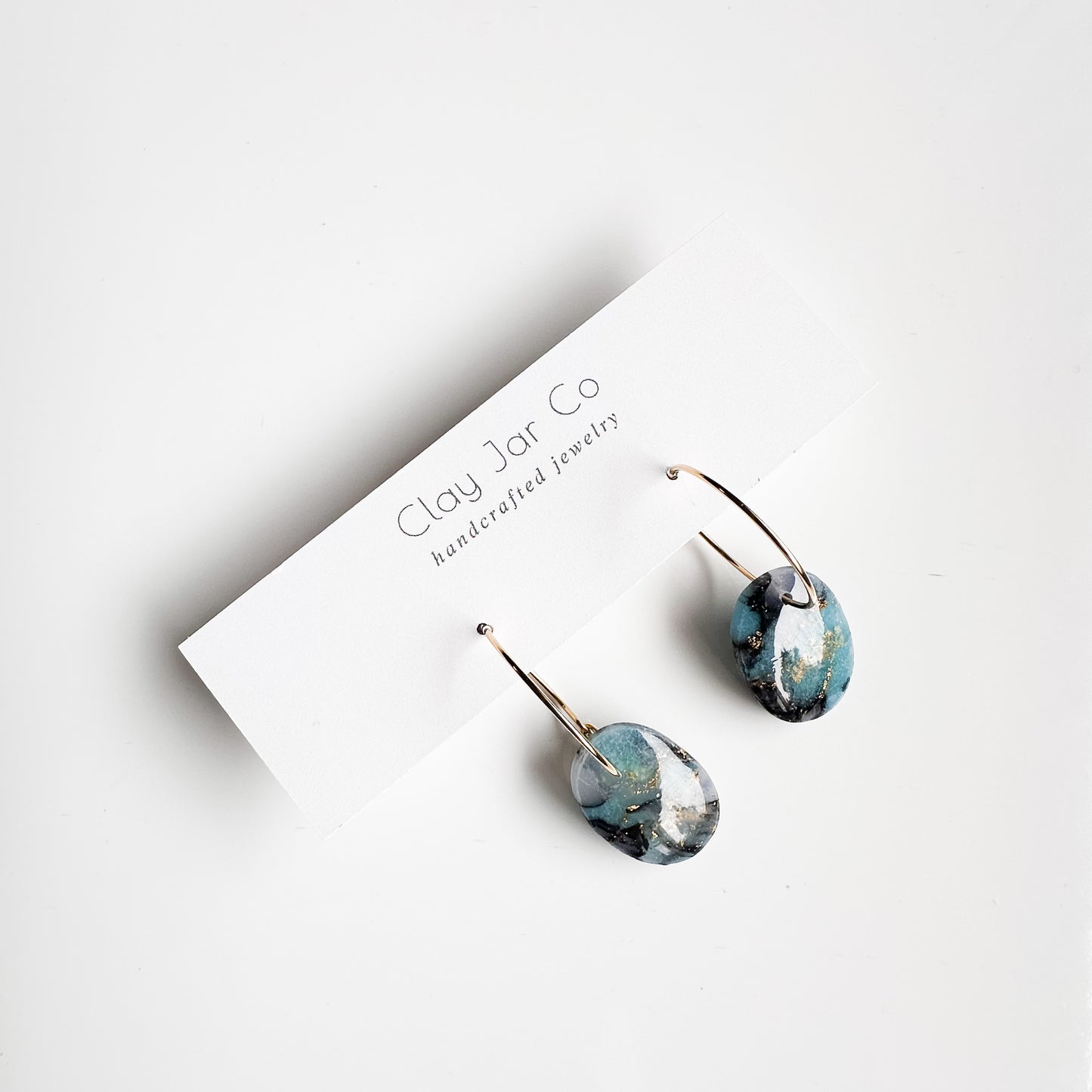 Molly Dangle Earrings in Midnight Marble with Gold Wire Hoops